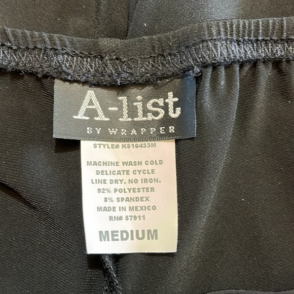 A-list by wrapper. Black light weight dress pants. Size Medium - Picture 3 of 6